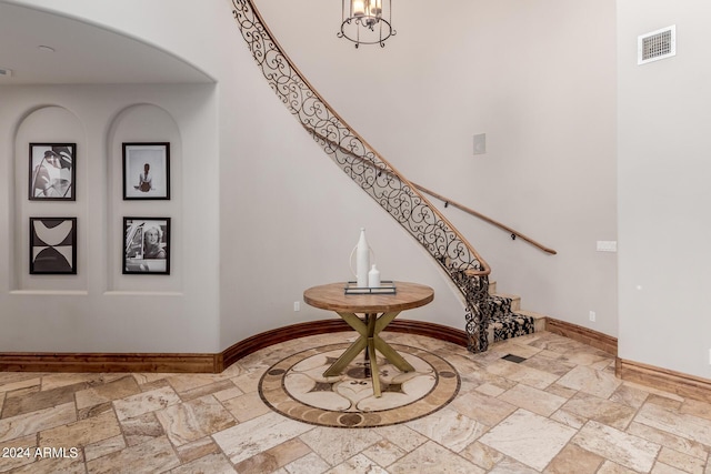 interior space featuring a notable chandelier