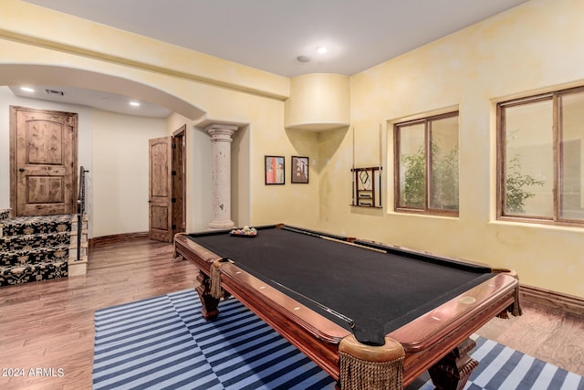 playroom with light hardwood / wood-style floors, pool table, and decorative columns