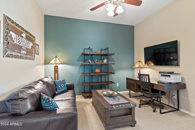 carpeted living room featuring ceiling fan