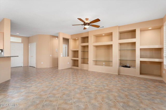 unfurnished living room with ceiling fan, built in shelves, visible vents, and recessed lighting