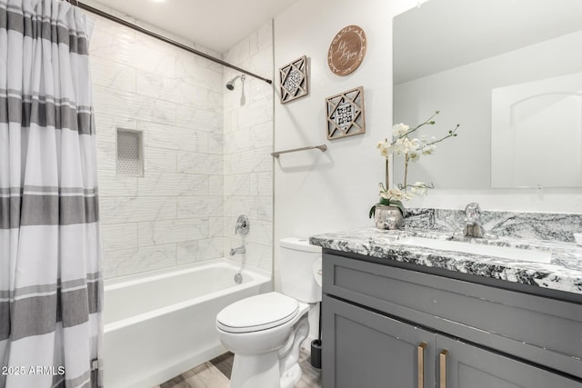 full bathroom with toilet, wood-type flooring, vanity, and shower / bath combo with shower curtain