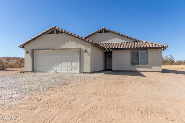 view of front of house with a garage