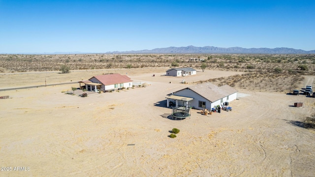 drone / aerial view featuring a mountain view