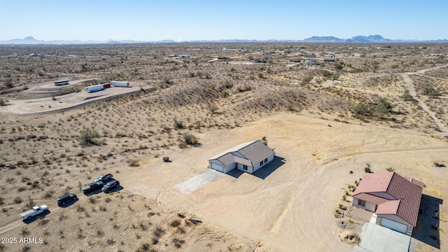 drone / aerial view featuring a mountain view