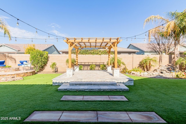 view of yard with a pergola and a patio area