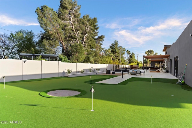 view of home's community featuring a patio and fence