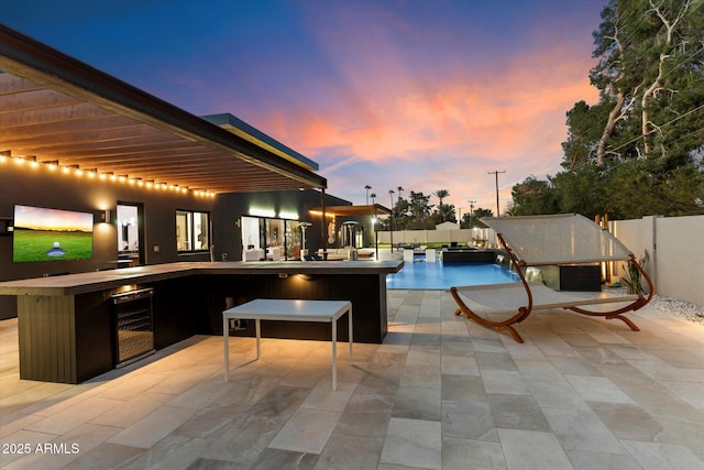 view of swimming pool featuring a fenced in pool, a patio, area for grilling, and a fenced backyard