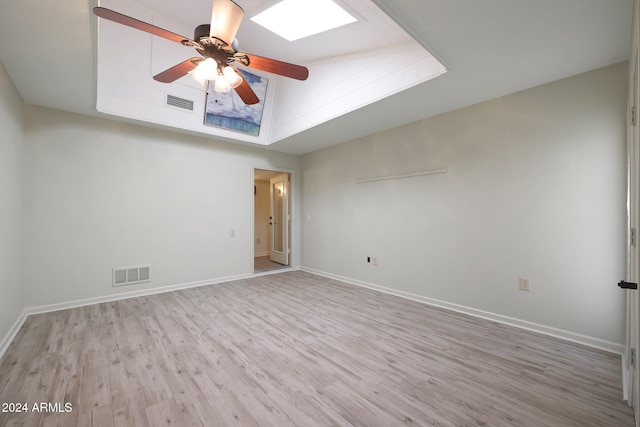 unfurnished room featuring ceiling fan and light wood-type flooring