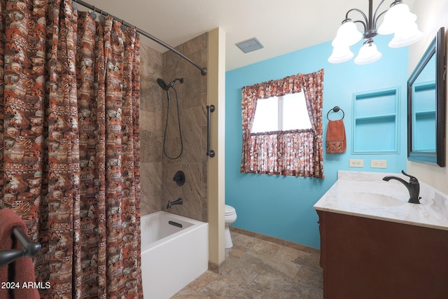 full bathroom with vanity, toilet, a notable chandelier, and shower / tub combo with curtain