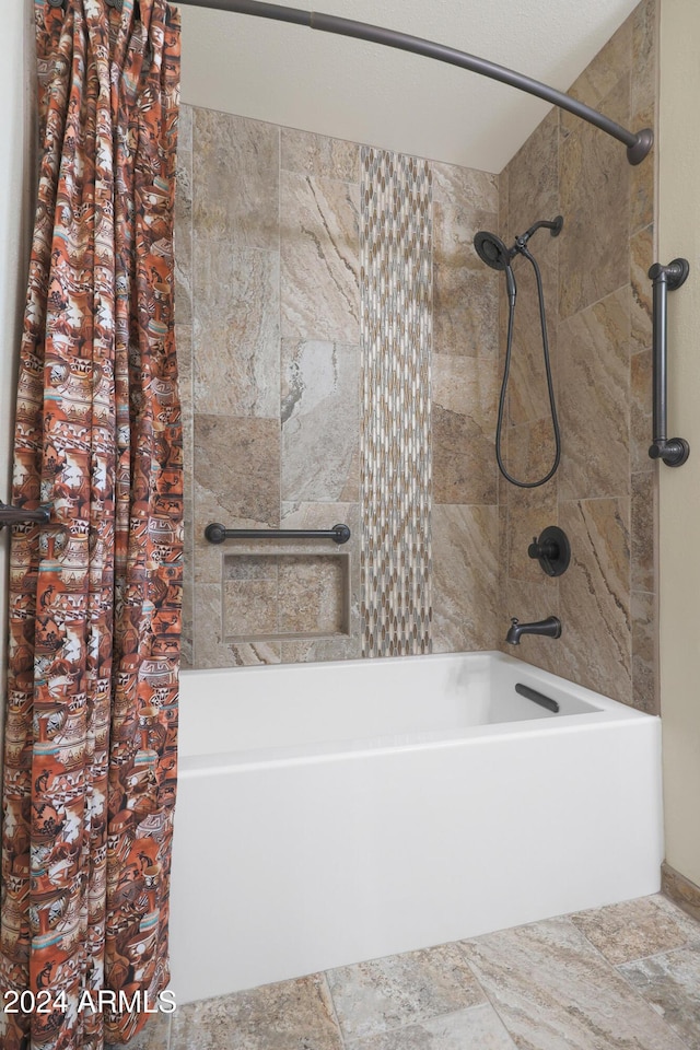 bathroom with shower / tub combo