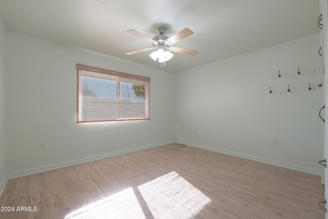 unfurnished room with light hardwood / wood-style floors and ceiling fan