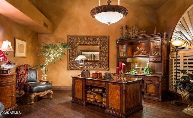 10365 E Paradise Dr, Scottsdale, AZ 85260 - bar featuring dark wood finished floors, a high ceiling, and baseboards
