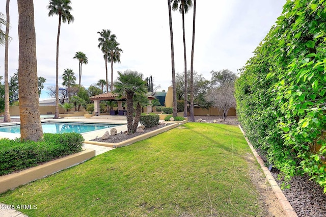 10365 E Paradise Dr, Scottsdale, AZ 85260 - view of yard featuring a gazebo, an outdoor pool, and fence