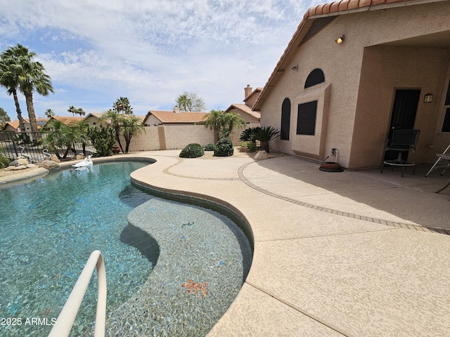 7724 W Topeka Dr W, Glendale, AZ 85308 - view of swimming pool featuring a patio and a fenced backyard