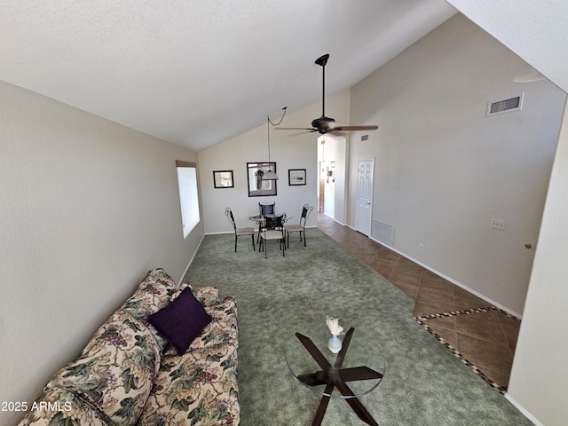7724 W Topeka Dr W, Glendale, AZ 85308 - tiled living area featuring lofted ceiling, ceiling fan, and baseboards