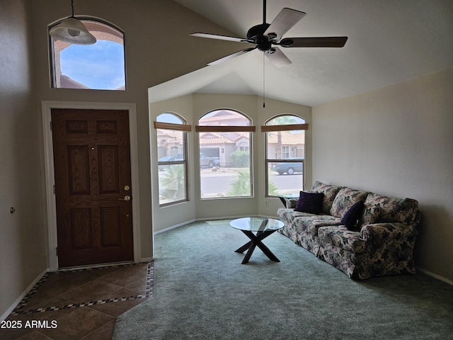7724 W Topeka Dr W, Glendale, AZ 85308 - living room featuring vaulted ceiling, plenty of natural light, ceiling fan, carpet floors, and baseboards