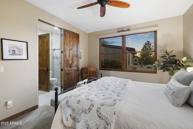 carpeted bedroom with ceiling fan and ensuite bathroom