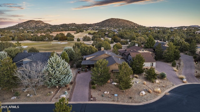 aerial view at dusk with a mountain view