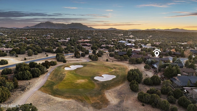 aerial view at dusk with a mountain view