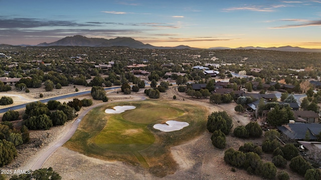 aerial view at dusk with a mountain view