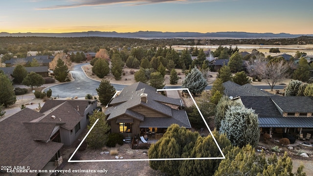 aerial view at dusk with a mountain view