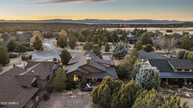 aerial view at dusk with a mountain view