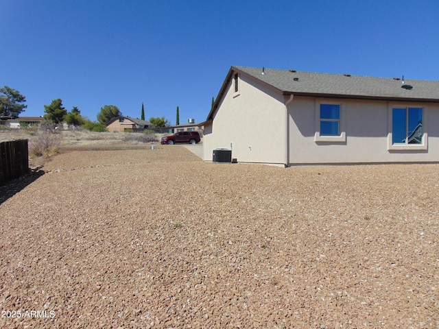 17707 E Jackrabbit Rd, Mayer, AZ 86333 - view of home's exterior featuring central AC unit and stucco siding