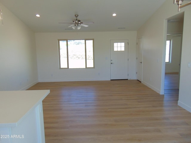 17707 E Jackrabbit Rd, Mayer, AZ 86333 - entrance foyer with a ceiling fan, recessed lighting, light wood-style floors, and baseboards