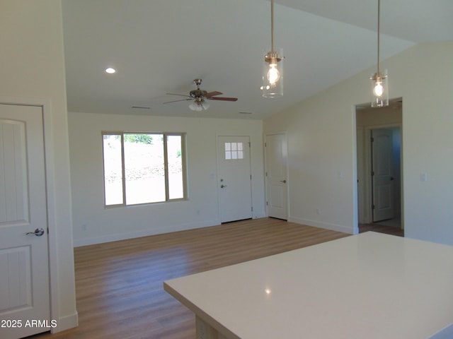 17707 E Jackrabbit Rd, Mayer, AZ 86333 - kitchen featuring a ceiling fan, plenty of natural light, light wood-style floors, pendant lighting, and recessed lighting