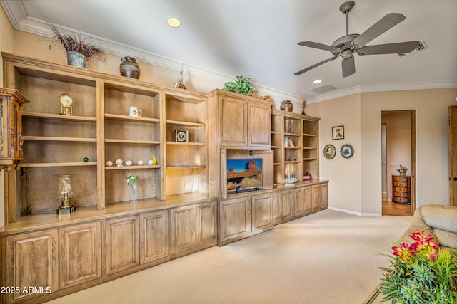 carpeted living room featuring ceiling fan and crown molding