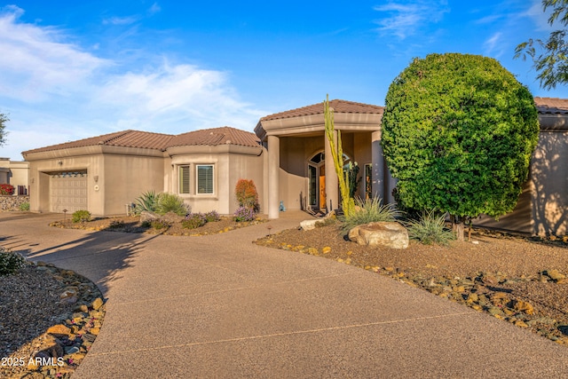 view of front of home with a garage