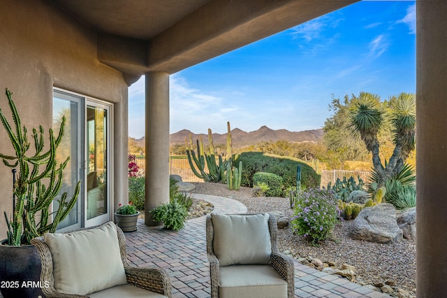 view of patio with a mountain view