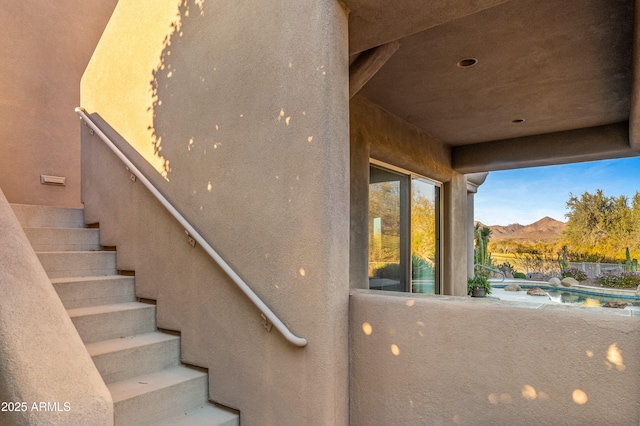 staircase with a mountain view