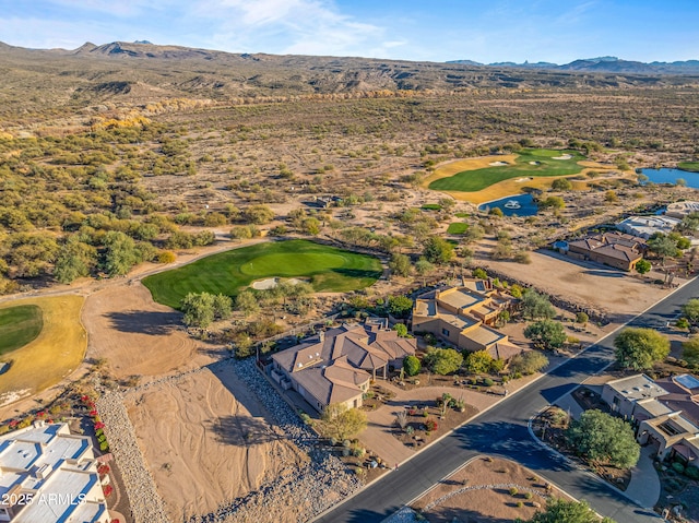 birds eye view of property featuring a mountain view