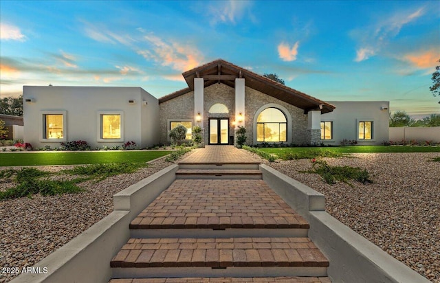 10755 E Cholla Ln, Scottsdale, AZ 85259 - view of front of house featuring stucco siding and french doors
