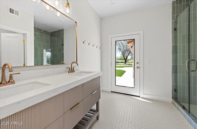 10755 E Cholla Ln, Scottsdale, AZ 85259 - bathroom with a shower stall, double vanity, and baseboards