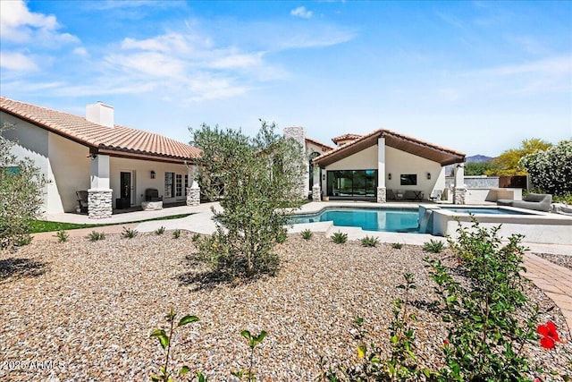 10755 E Cholla Ln, Scottsdale, AZ 85259 - outdoor pool featuring a patio area, a hot tub, and french doors