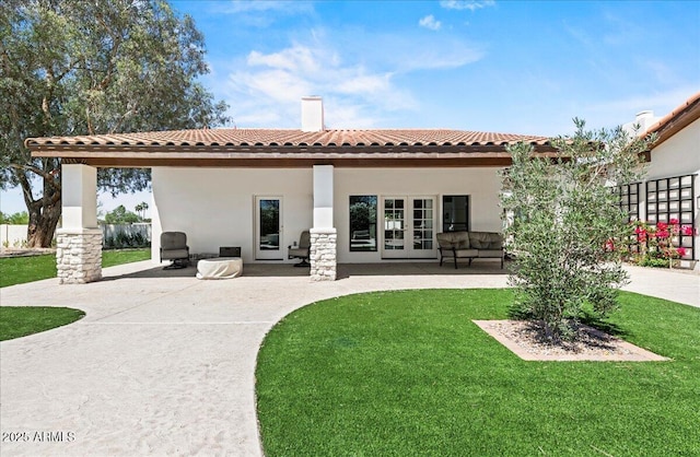 10755 E Cholla Ln, Scottsdale, AZ 85259 - rear view of property featuring a tile roof, stucco siding, and a patio area