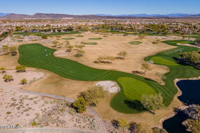 birds eye view of property featuring a mountain view