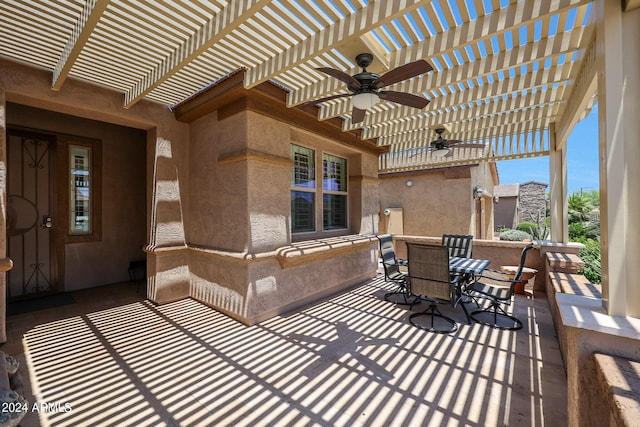 view of patio featuring ceiling fan and a pergola