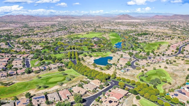 bird's eye view with a water and mountain view