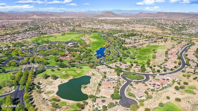 birds eye view of property featuring a water and mountain view