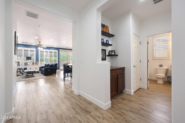 hall featuring light wood-type flooring