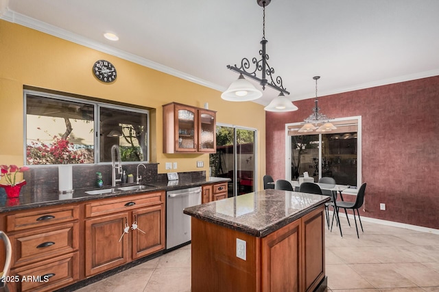 kitchen with brown cabinets, a sink, stainless steel dishwasher, crown molding, and glass insert cabinets