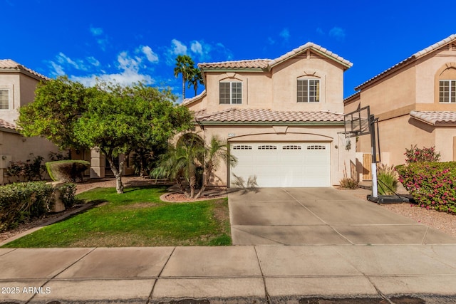 mediterranean / spanish-style house featuring a front lawn, a tile roof, concrete driveway, stucco siding, and an attached garage