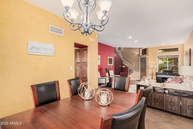 dining area with an inviting chandelier, stairway, recessed lighting, and visible vents