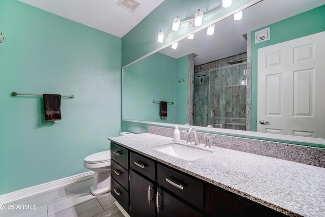 5122 E Shea Blvd Unit 1020, Scottsdale, AZ 85254 - full bathroom featuring vanity, baseboards, visible vents, a shower stall, and toilet