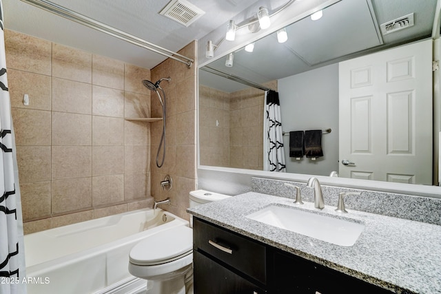 5122 E Shea Blvd Unit 1020, Scottsdale, AZ 85254 - full bathroom featuring visible vents, toilet, shower / bath combo, and vanity