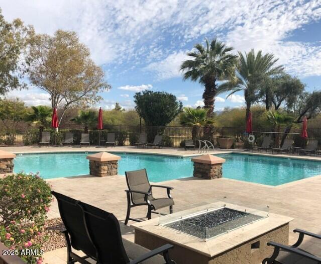 5122 E Shea Blvd Unit 1020, Scottsdale, AZ 85254 - community pool featuring a patio area, a fire pit, and fence