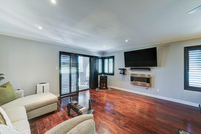 5122 E Shea Blvd Unit 1020, Scottsdale, AZ 85254 - living room featuring crown molding, recessed lighting, wood finished floors, and baseboards